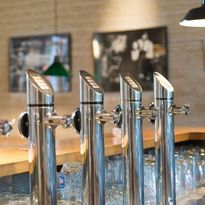 Detail view taps in the taproom of the restaurant